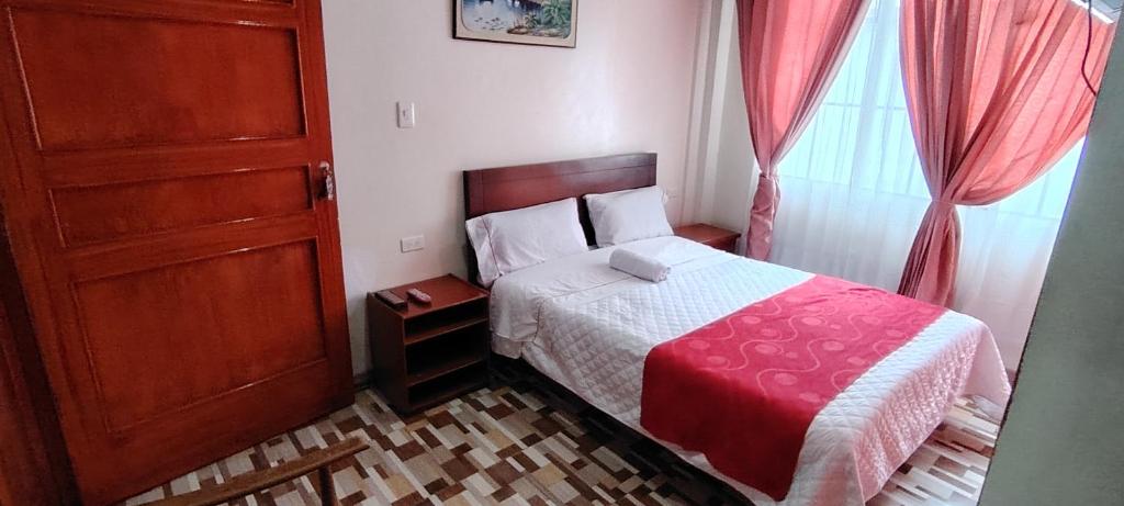 Postel nebo postele na pokoji v ubytování Hotel Gun Glub