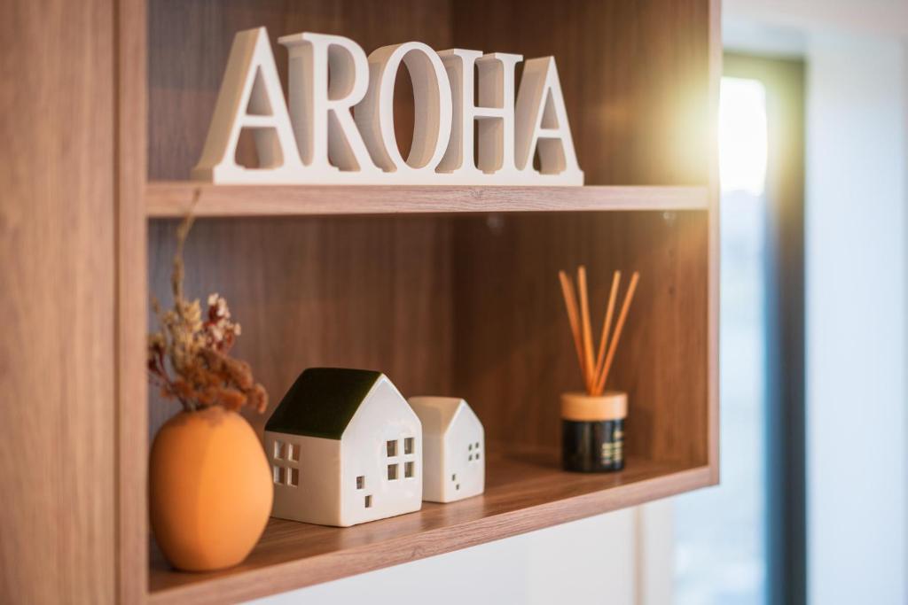 a shelf with a toy house and aania on it at Nova Heights in Lake Tekapo