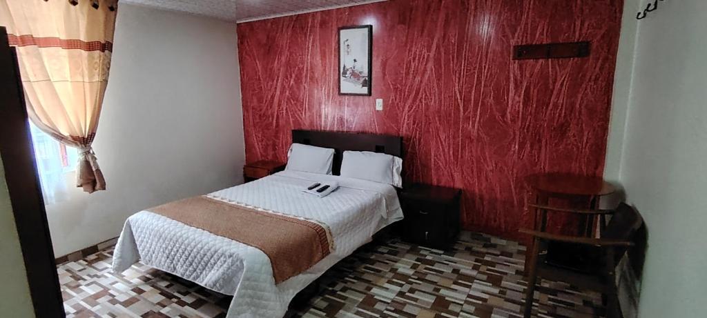 Postel nebo postele na pokoji v ubytování Hotel Gun Glub