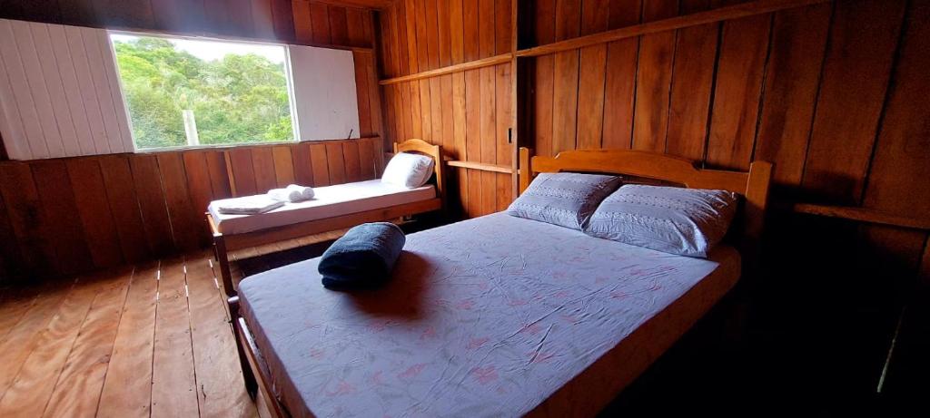 Postel nebo postele na pokoji v ubytování Pousada Toca do Tatu