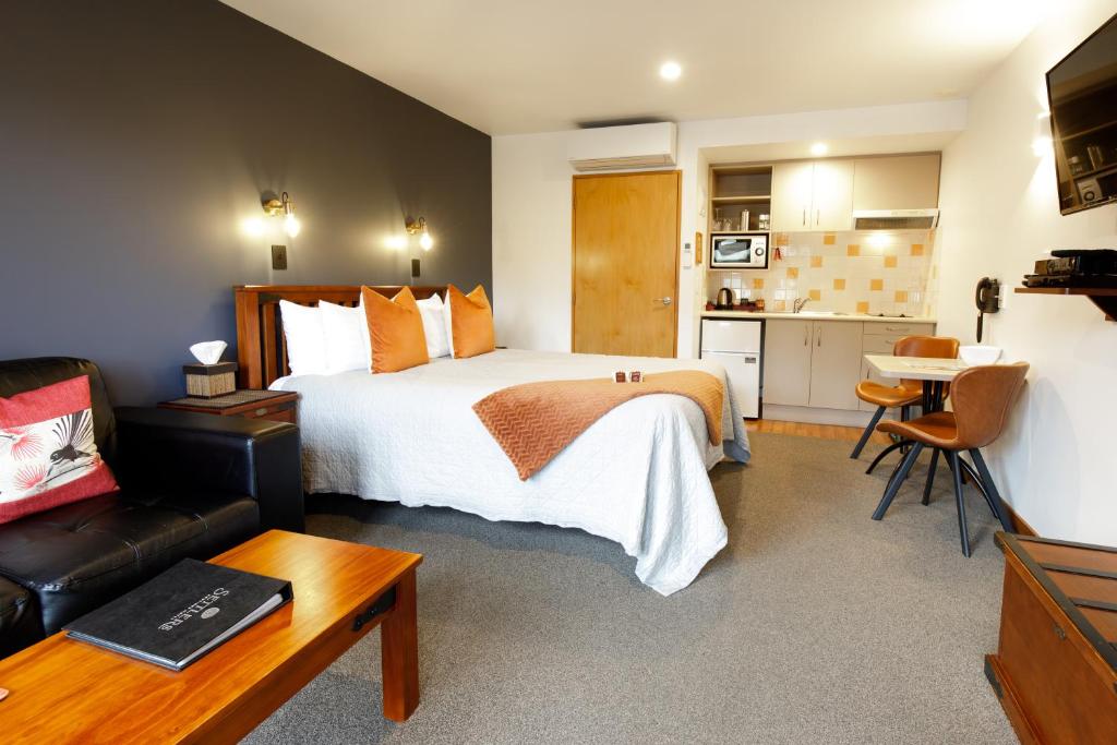 Postel nebo postele na pokoji v ubytování Settlers Boutique Motel