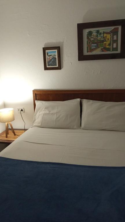 Postel nebo postele na pokoji v ubytování Pitanga Ilha Grande