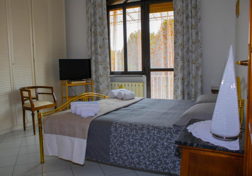 Postel nebo postele na pokoji v ubytování Villa a Schiera Moncalieri - 10 min da Torino