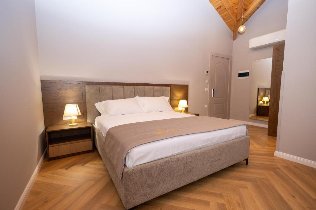 Postel nebo postele na pokoji v ubytování Boutique Hotel Vila 101