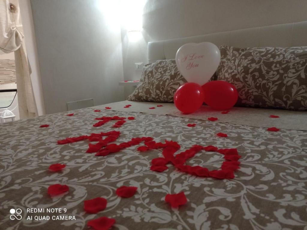 Postel nebo postele na pokoji v ubytování Suite Maison Rouge