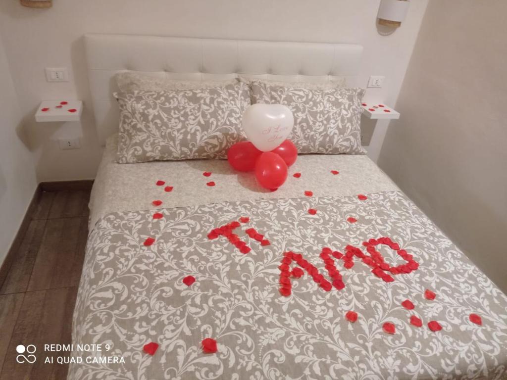 Postel nebo postele na pokoji v ubytování Suite Maison Rouge
