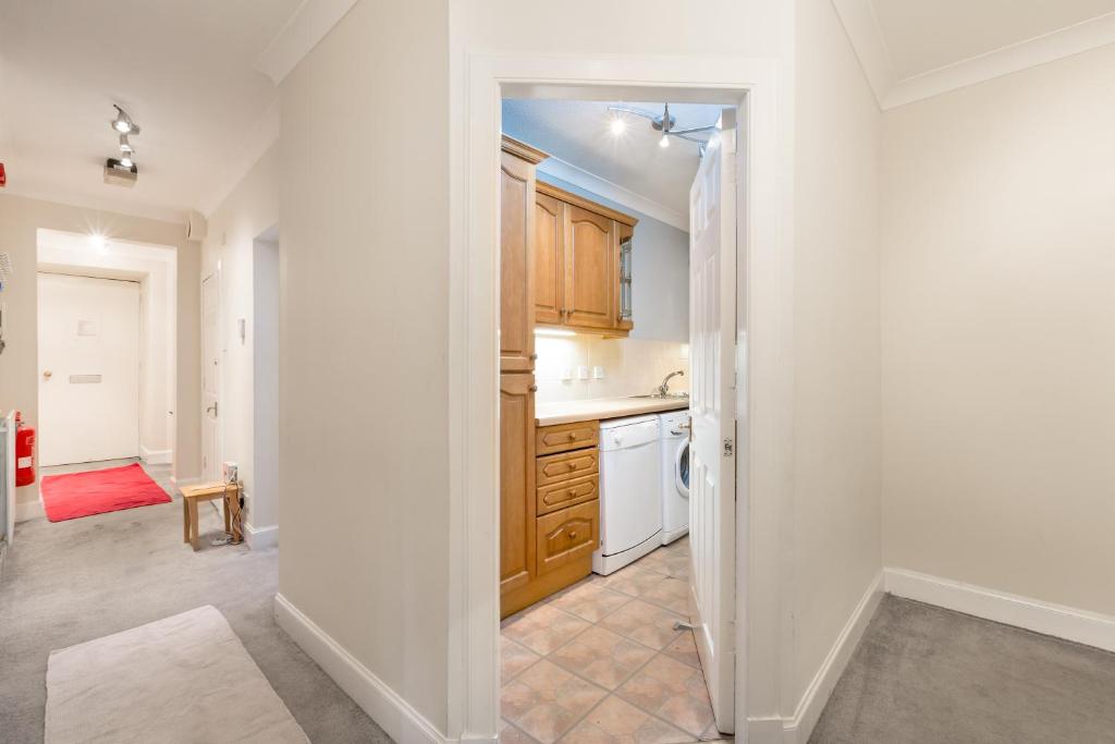 Kuchyň nebo kuchyňský kout v ubytování Rose Street Residence
