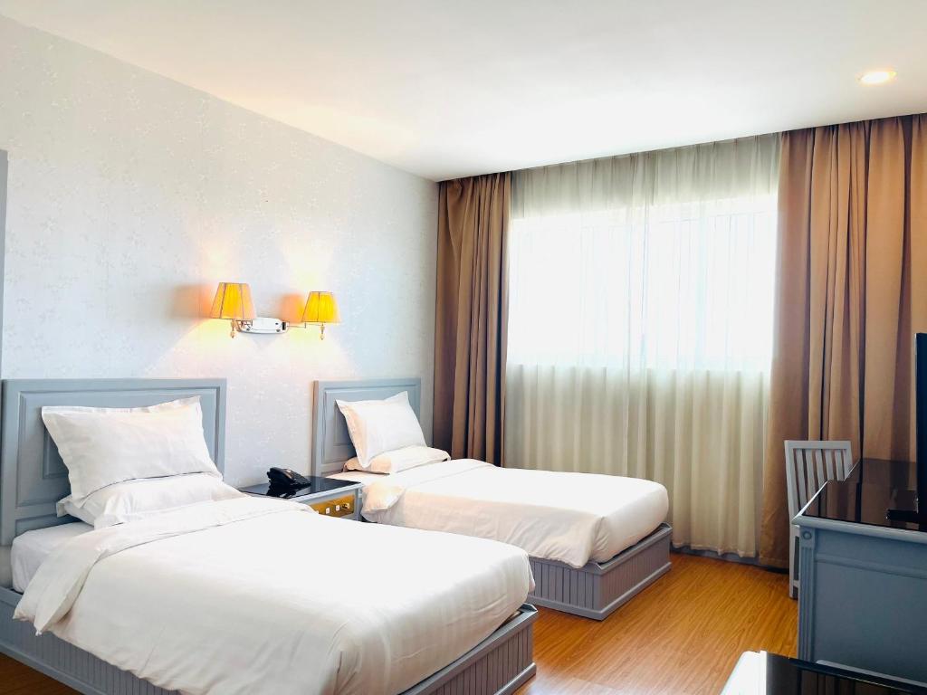 Postel nebo postele na pokoji v ubytování Penview Hotel