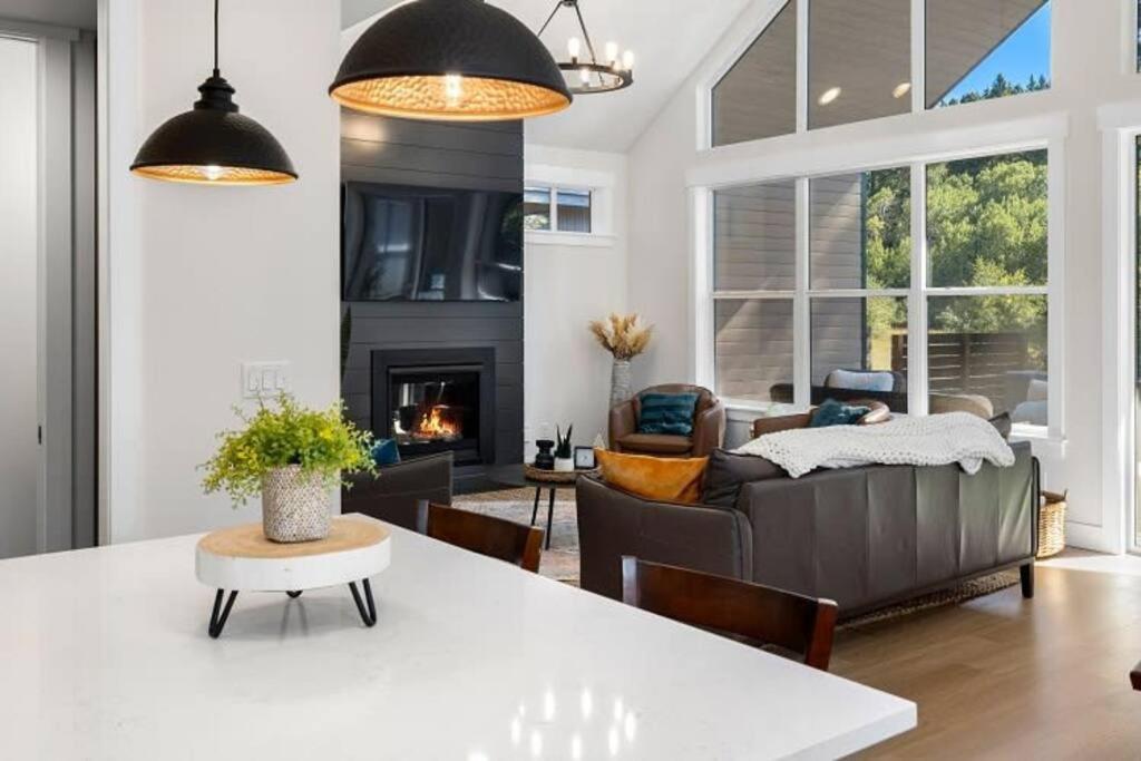 a living room with a couch and a fireplace at Harmony Retreat in Ronald