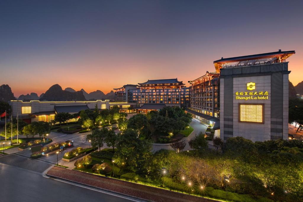 a rendering of the exterior of a resort at night at Shangri-La Guilin in Guilin
