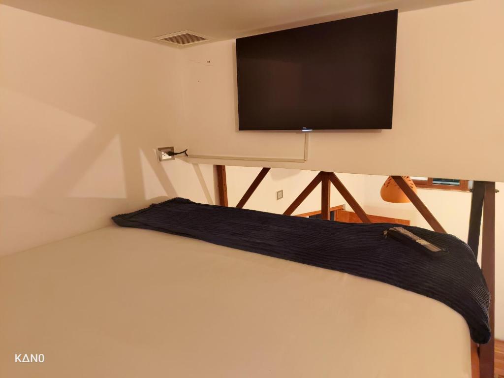 TV a/nebo společenská místnost v ubytování Hospedaje Oasis Blue Laureles Medellín