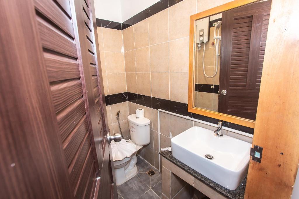 Koupelna v ubytování Grand Elevation Hotel