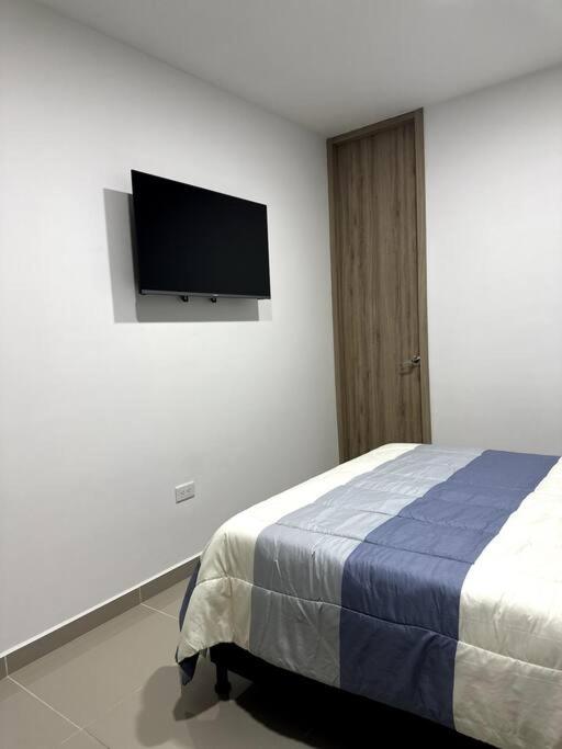 TV a/nebo společenská místnost v ubytování Hermoso Apartamento Entero