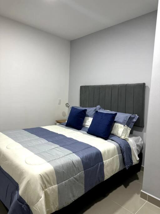 Postel nebo postele na pokoji v ubytování Hermoso Apartamento Entero