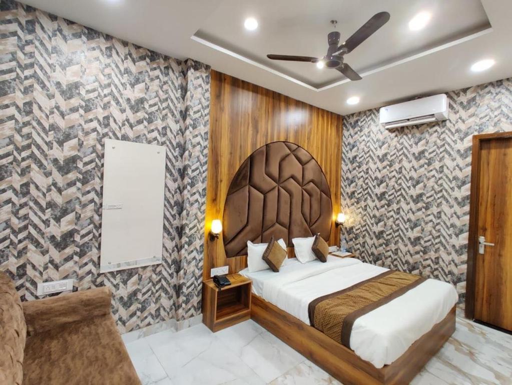 Voodi või voodid majutusasutuse Hotel GS Grand Amritsar toas