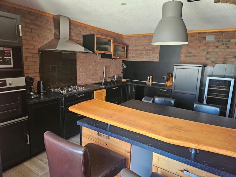 Kuchyň nebo kuchyňský kout v ubytování Le IV