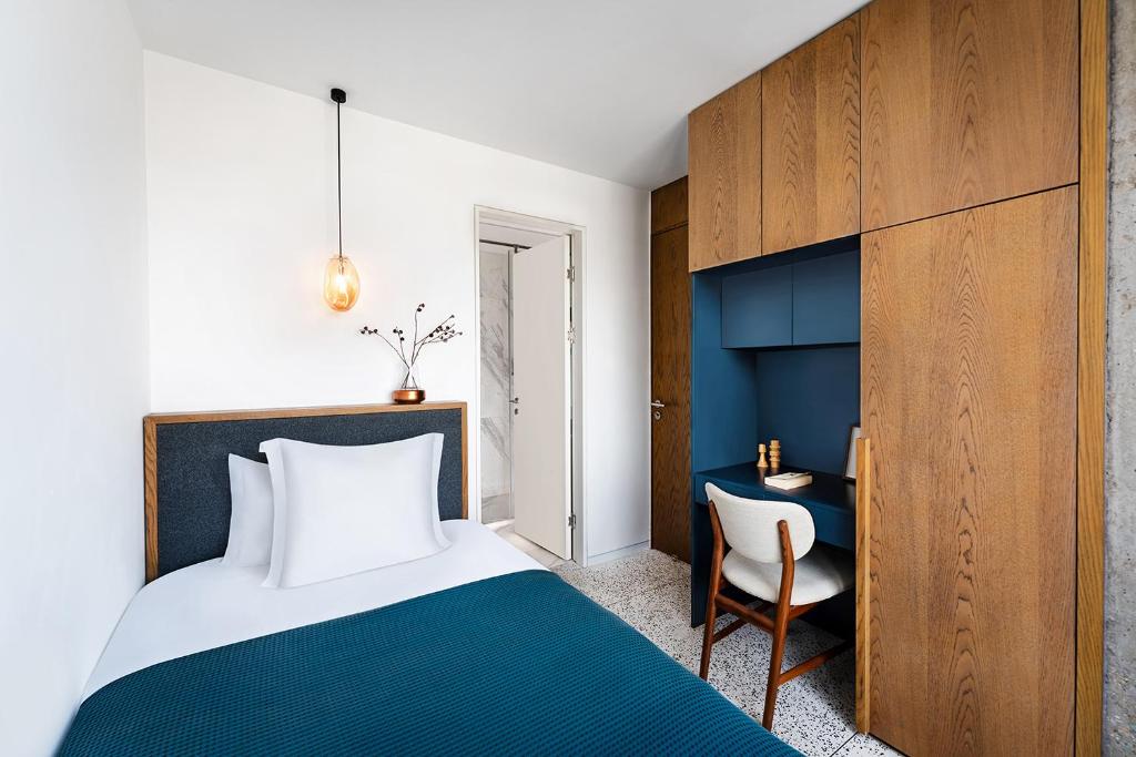 Postel nebo postele na pokoji v ubytování basePLUS-Shanghai BINJIANG Serviced Apartment