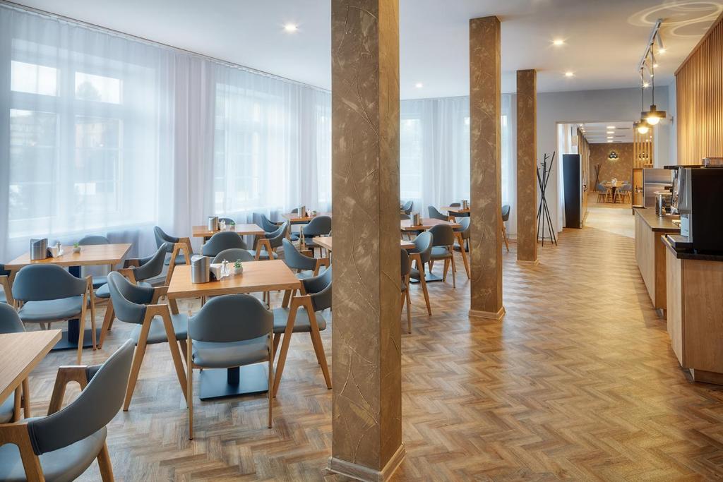 Veitingastaður eða matsölustaður á Wellness Hotel Babylon