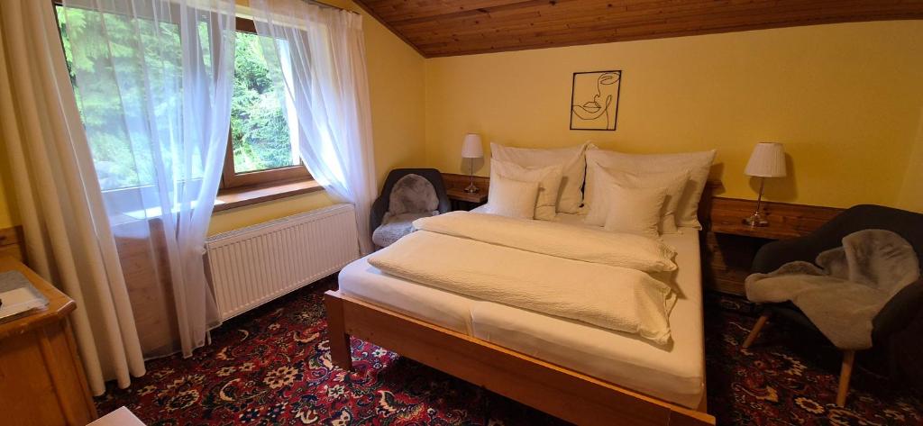 Postel nebo postele na pokoji v ubytování Pension Vinkl