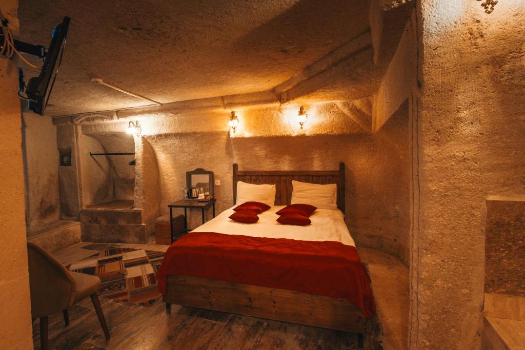 Postel nebo postele na pokoji v ubytování Sierra Cave Göreme Cappadocia