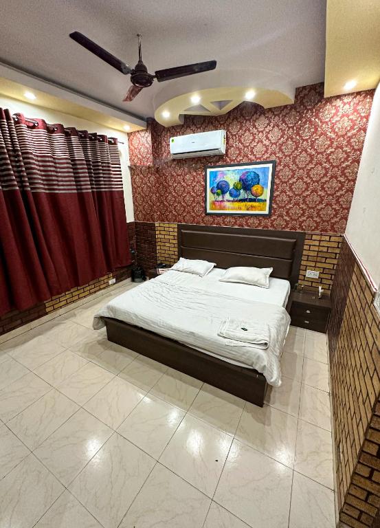 Postel nebo postele na pokoji v ubytování Hotel Ace