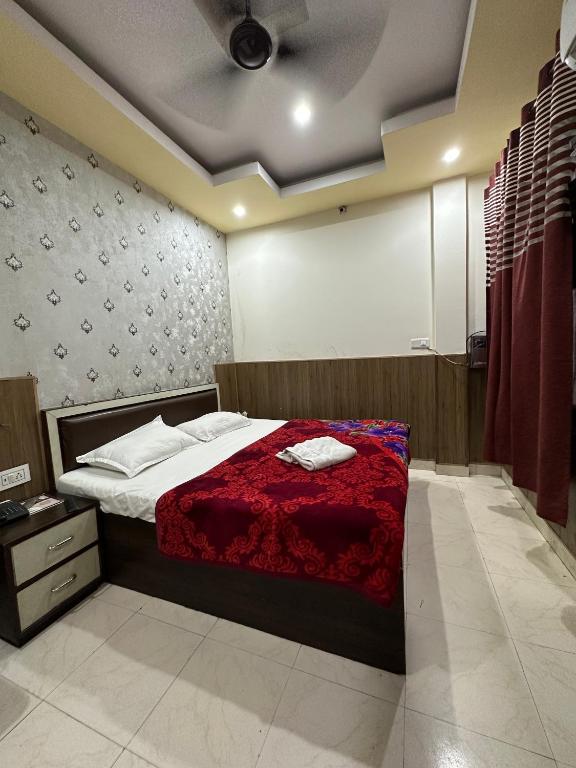 Postel nebo postele na pokoji v ubytování Hotel Ace