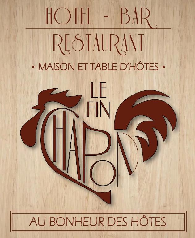 un panneau indiquant un restaurant avec un cœur sur lui dans l'établissement Le Fin Chapon, à Excideuil