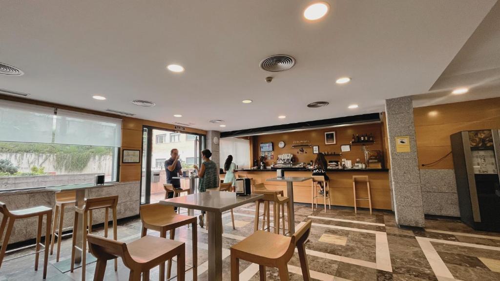 Kuchyň nebo kuchyňský kout v ubytování Hotel-Apartamentos Tartesos