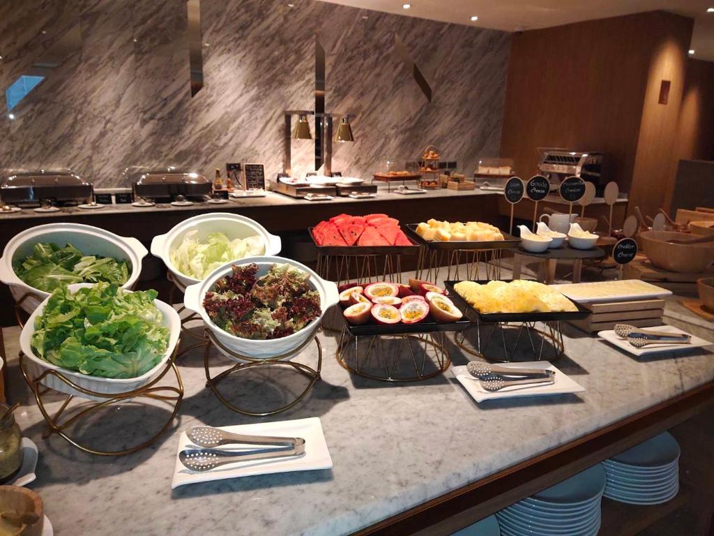 A broad view of the salad, sushi and cold-food buffet.
