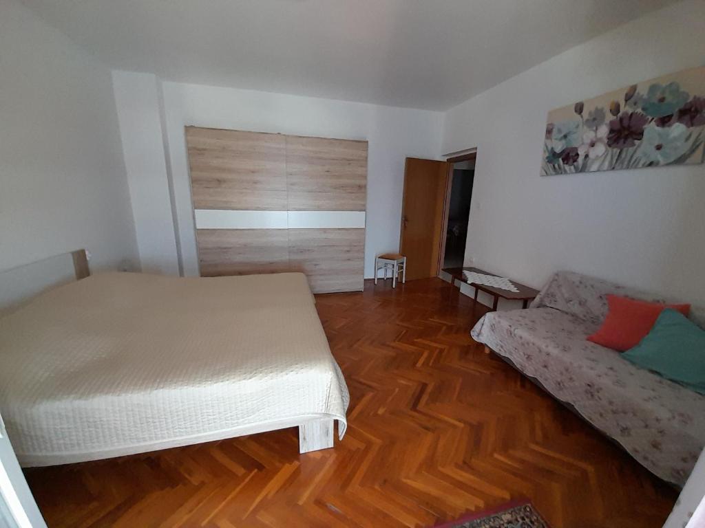 Postel nebo postele na pokoji v ubytování Apartments and Studios Vinko Matić