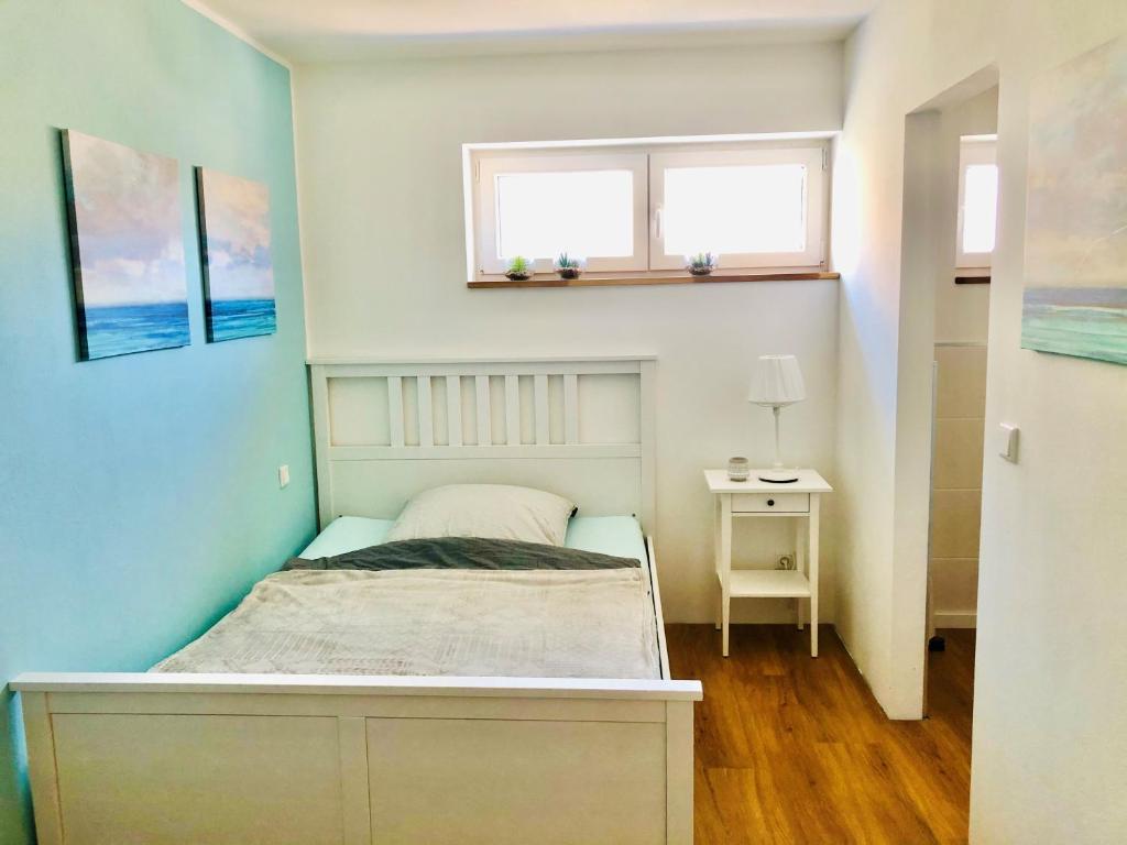 Ένα ή περισσότερα κρεβάτια σε δωμάτιο στο StayNature 1BR APP in zentraler Lage