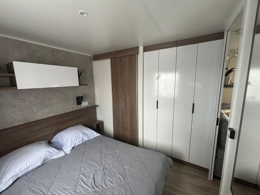 Postel nebo postele na pokoji v ubytování Mobil home Cygne 85