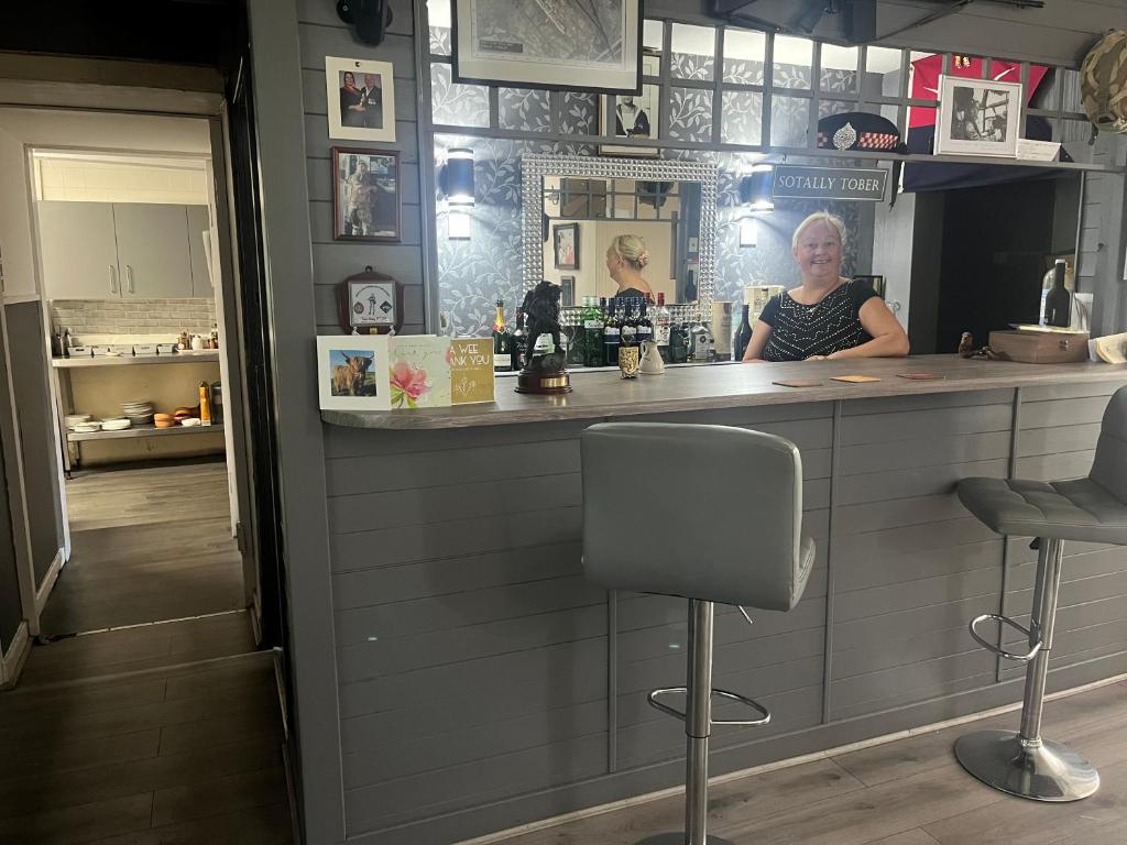 Příslušenství pro přípravu čaje a kávy v ubytování Dellwood Hotel