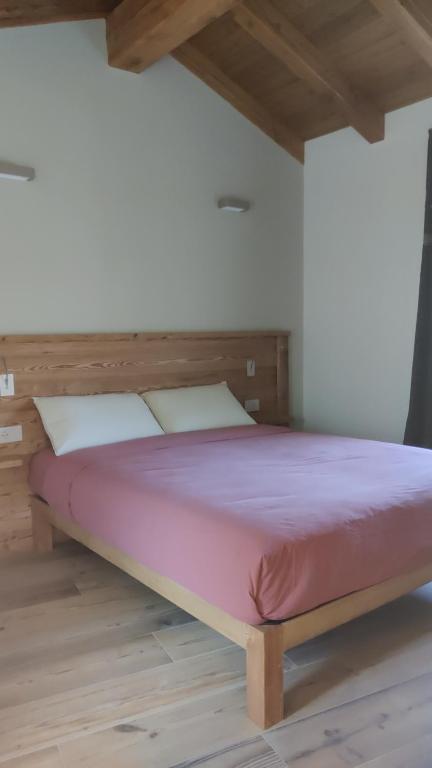 Postel nebo postele na pokoji v ubytování La Tornalla