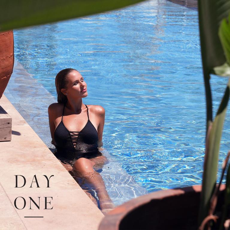 The swimming pool at or close to Day One Beach Resort & SPA - Adult Only