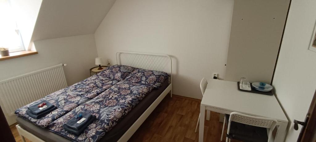 Postel nebo postele na pokoji v ubytování Ubytování U Tajčů