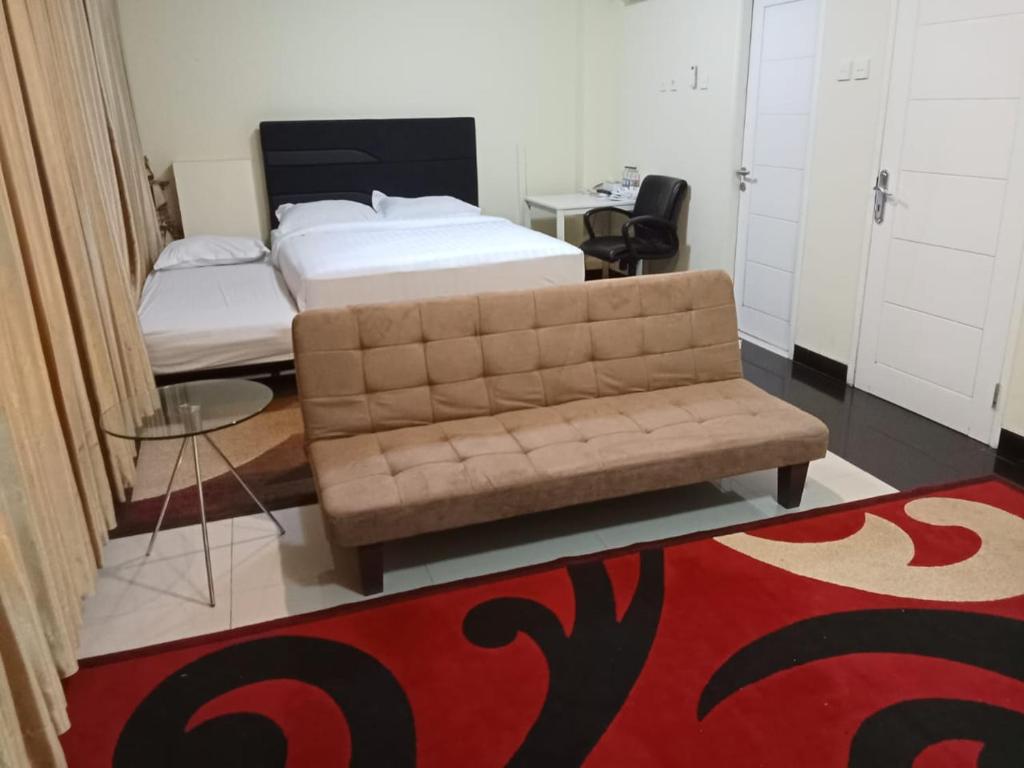 Letto o letti in una camera di Multi 88 Syariah