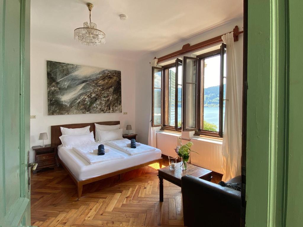 Postel nebo postele na pokoji v ubytování Villa Streintz