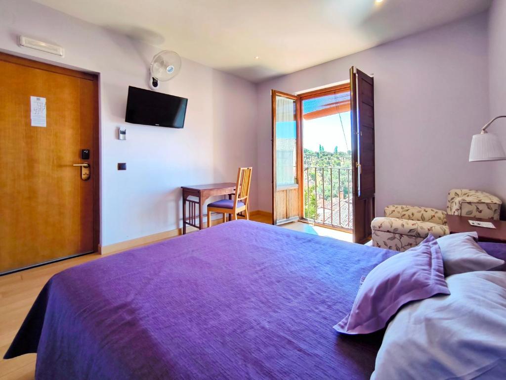 Cama o camas de una habitación en Hospedaje La Judería
