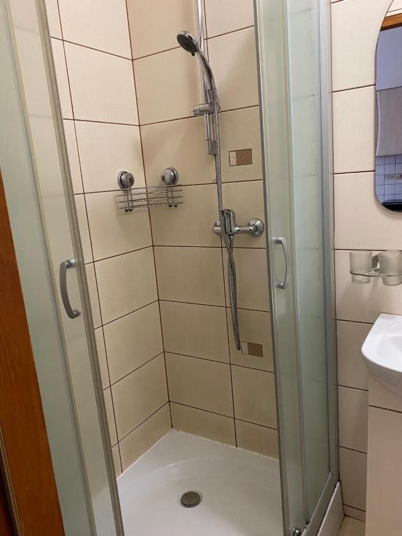 Kúpeľňa v ubytovaní Pokoje Sylwia z aneksami kuchennymi w każdym pokoju