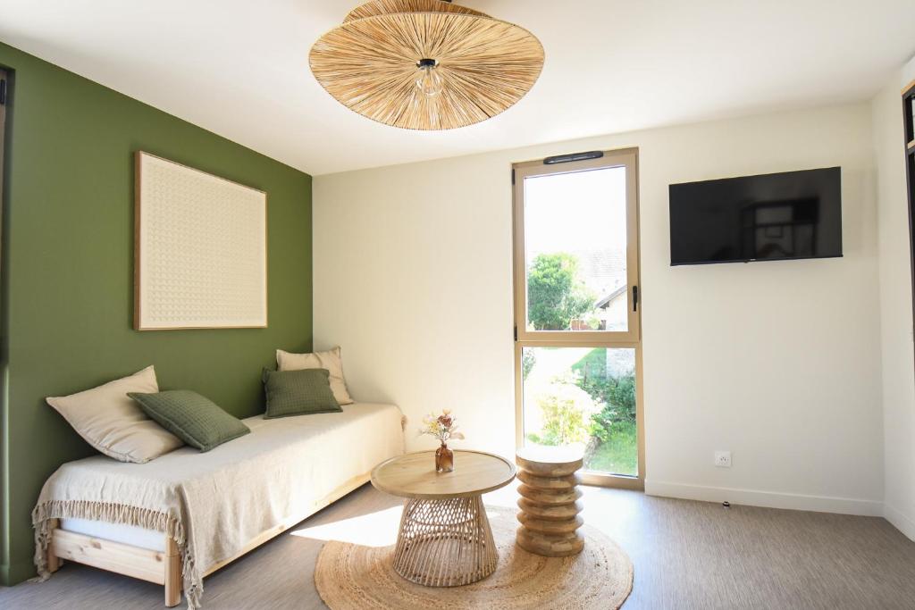 Postel nebo postele na pokoji v ubytování Le Clos des Cadoles