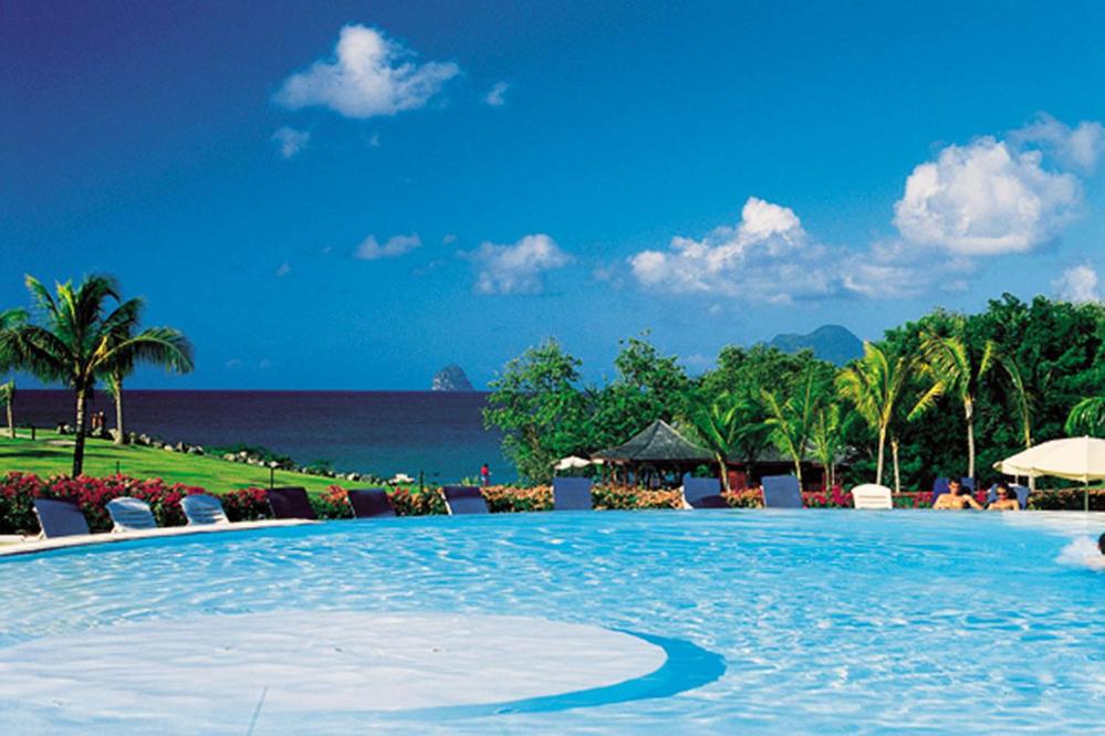 Bazén v ubytování Le MaDja'Kaz - studio en résidence et bord de Mer - Sainte Luce Martinique nebo v jeho okolí