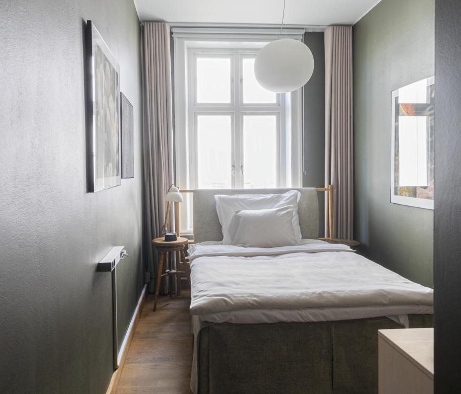 Postel nebo postele na pokoji v ubytování TwentySix