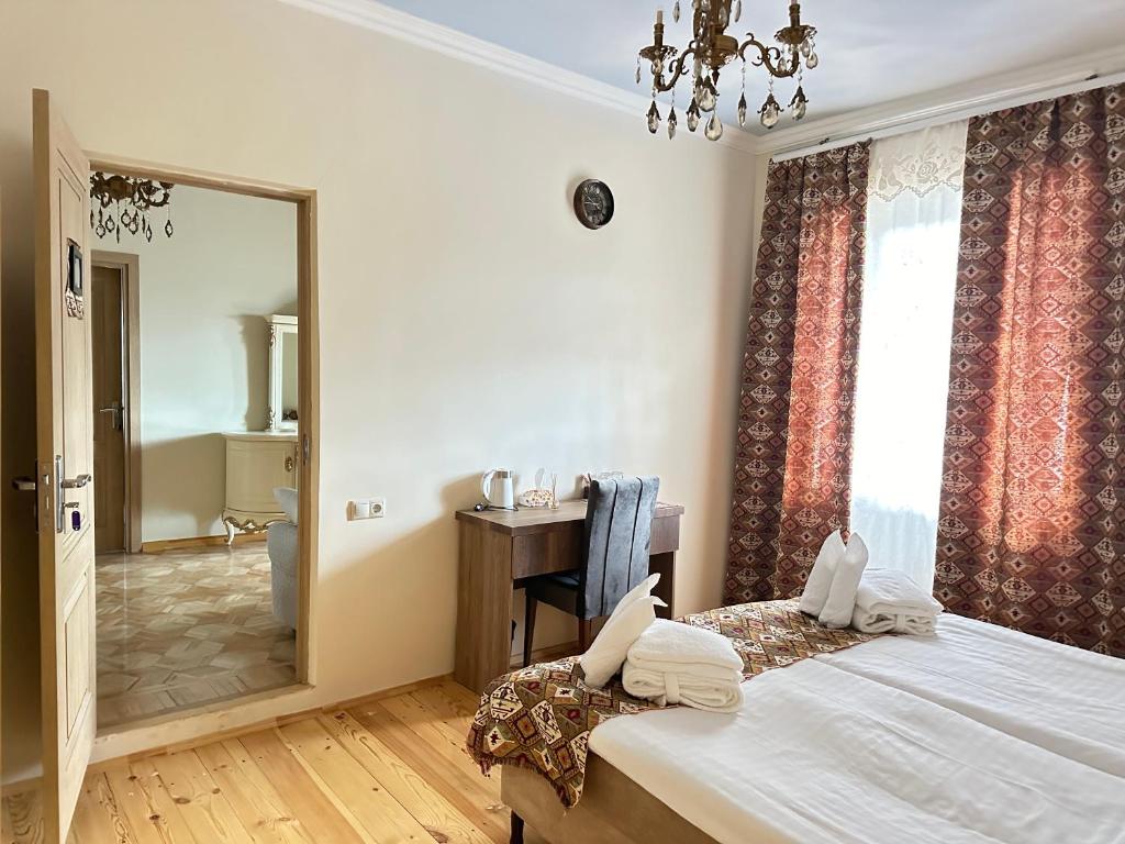 Postel nebo postele na pokoji v ubytování Deghceni clubhouse