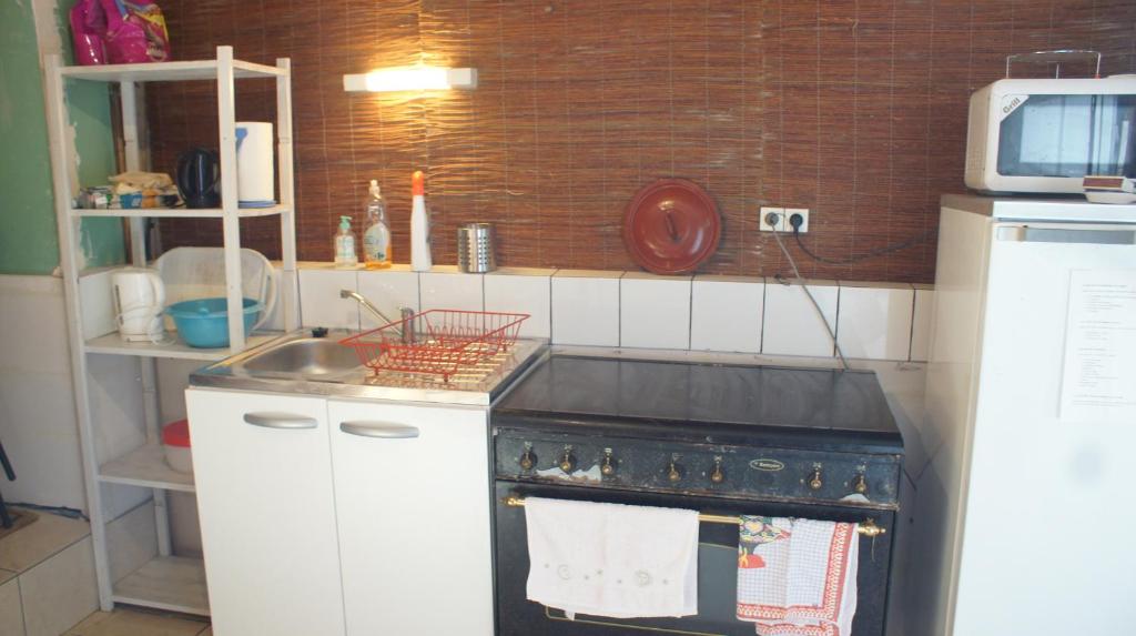 Kuchyň nebo kuchyňský kout v ubytování Chambres d'hôtes La Hourqueyre