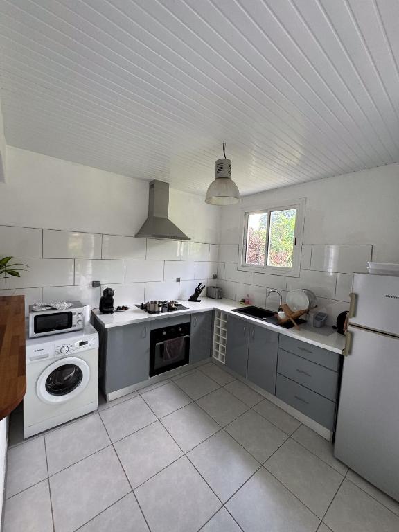 Kuchyň nebo kuchyňský kout v ubytování Casa Tropical · T3 Calme & Spacieux