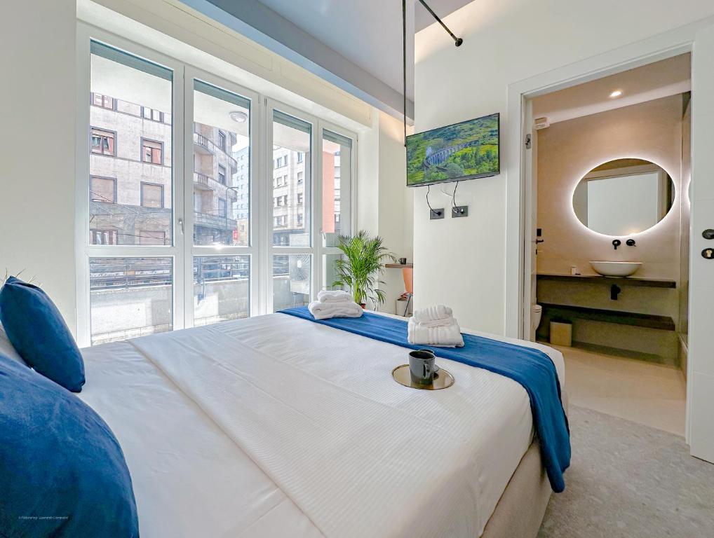 Postel nebo postele na pokoji v ubytování Porta Venezia - Luxy Suites - 6 camere