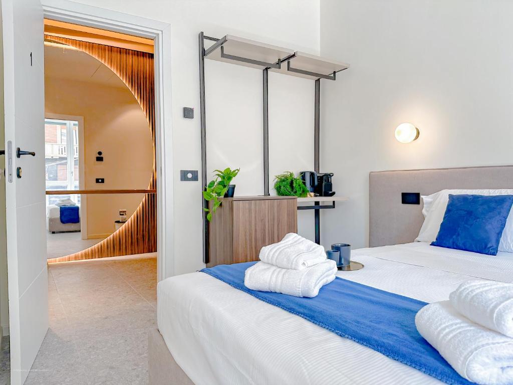Postel nebo postele na pokoji v ubytování Porta Venezia - Luxy Suites - 6 camere