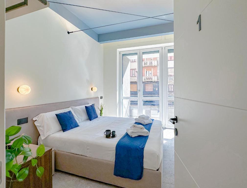 Postel nebo postele na pokoji v ubytování Porta Venezia - Luxy Suites - 6 camere