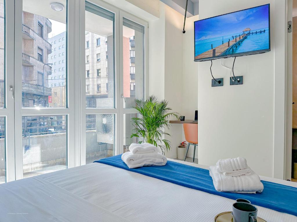 Postel nebo postele na pokoji v ubytování Porta Venezia - Luxy Suites - 6 camere